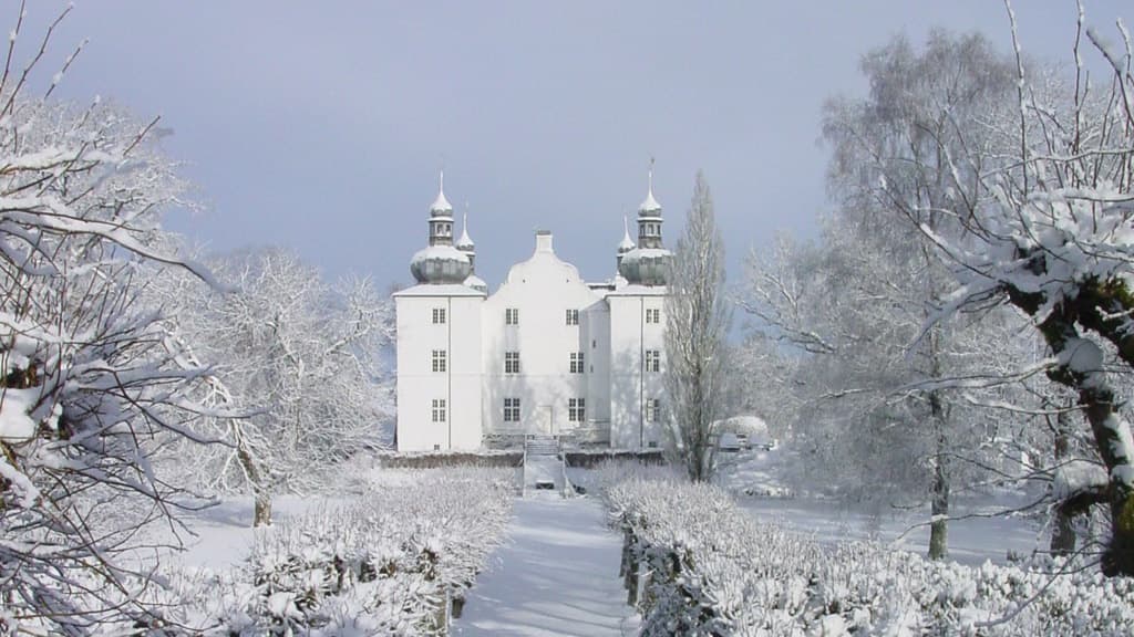 Engelsholm Castle and the trees covered in snow